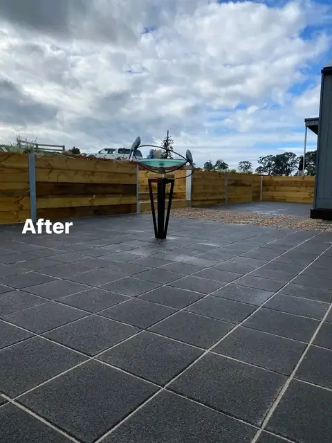 Landscaped yard with timber retaining walls, merbau deck and charcoal paving (3 of 8)