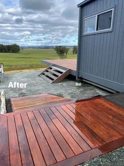 Landscaped yard with timber retaining walls, merbau deck and charcoal paving (4 of 8)