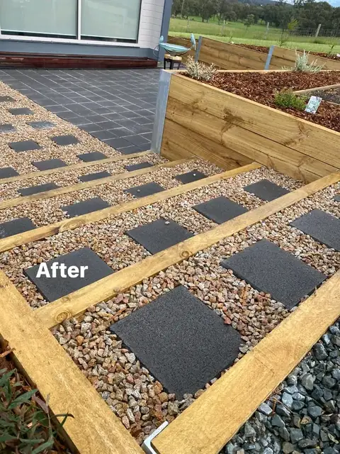 Landscaped yard with timber retaining walls, merbau deck and charcoal paving (6 of 8)