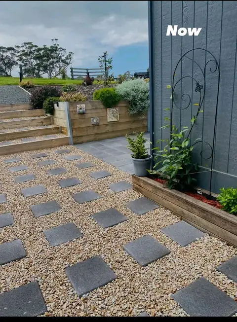 Landscaped yard with timber retaining walls, merbau deck and charcoal paving (7 of 8)