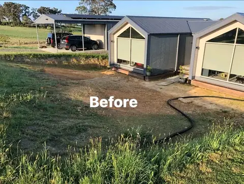Landscaped yard with timber retaining walls, merbau deck and charcoal paving (8 of 8)