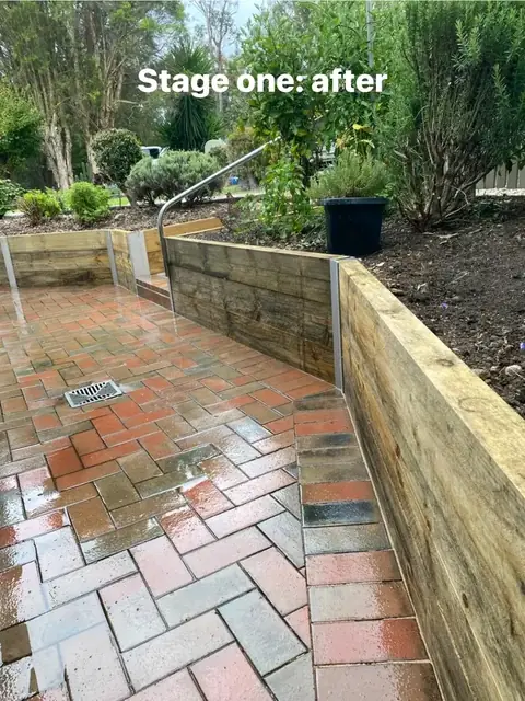 Red brick paving and timber sleeper walls with a stone courtyard (3 of 8)