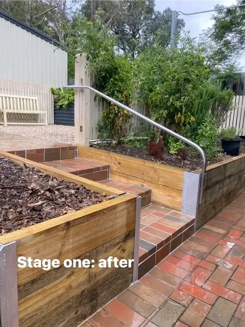 Red brick paving and timber sleeper walls with a stone courtyard (6 of 8)