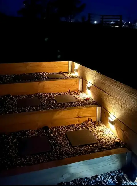 Pond, pergola and lit timber steps in a landscaped garden (5 of 8)