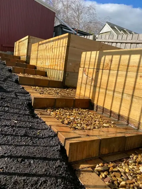 Pond, pergola and lit timber steps in a landscaped garden (8 of 8)