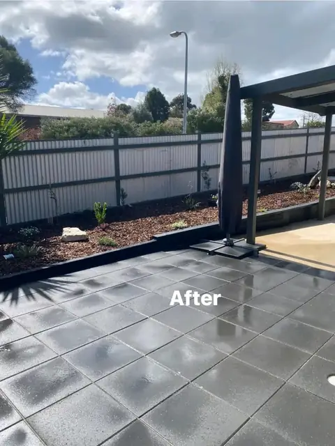 Paved side yard with yuccas, timber edging and garden beds (4 of 9)