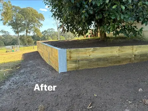 New timber sleeper retaining wall on steel posts