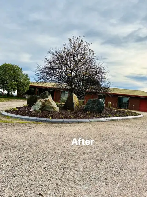 Feature-rock turning circle, new fence and a drainage trench