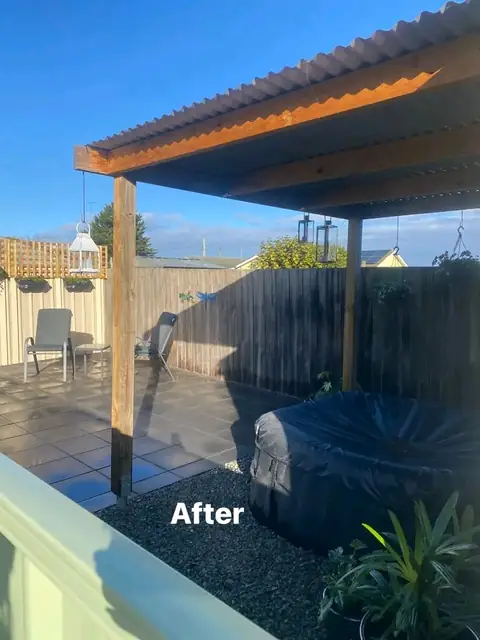 Refreshed yard with pergola, charcoal paving and mulched garden beds (3 of 8)