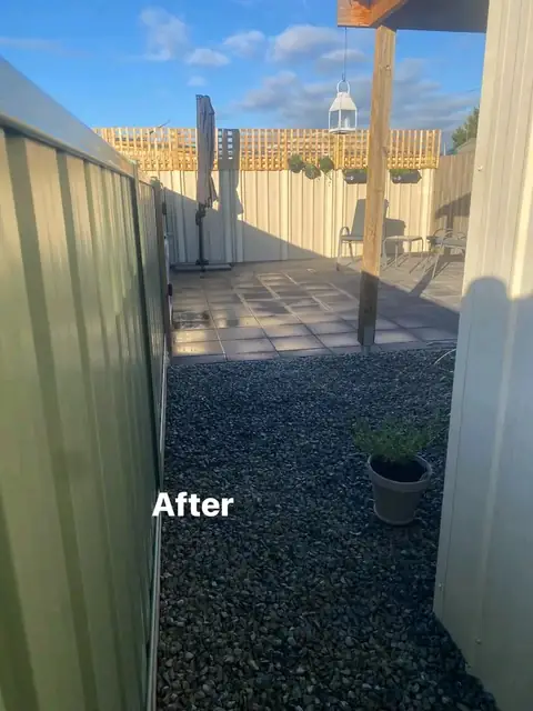 Refreshed yard with pergola, charcoal paving and mulched garden beds (6 of 8)