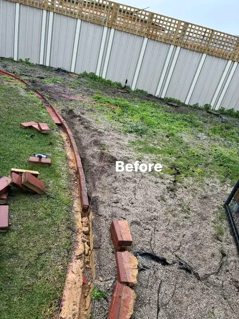 Refreshed yard with pergola, charcoal paving and mulched garden beds (7 of 8)